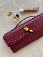 Anna Geflochtene Clutch